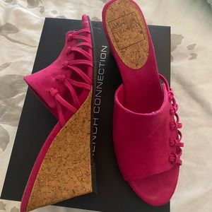 Never worn women’s fuchsia Wedge sandals